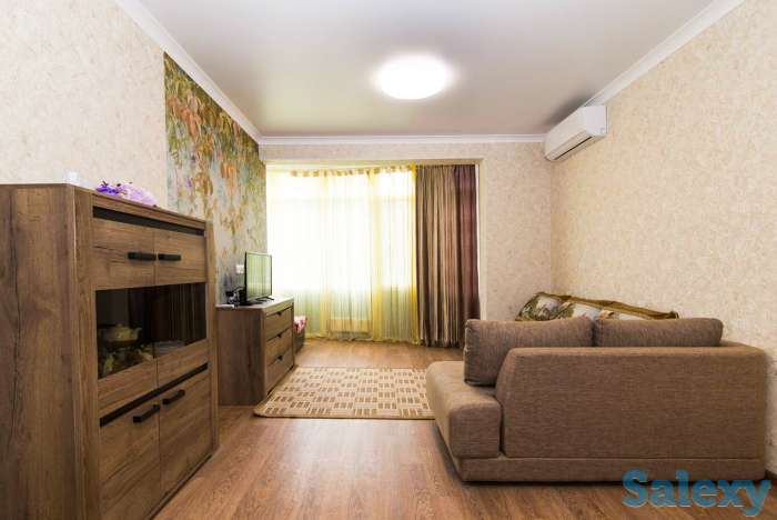 Комфортные апартаменты в центре города, Ул. Навои 9/1, фотография 12