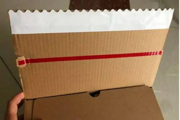 Аппликаторная линия наносит клейкую ленту на гофрированный картон, фотография 2