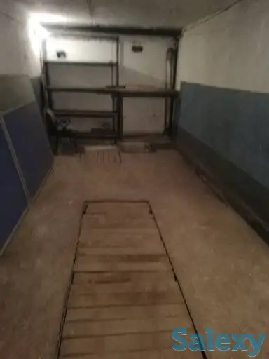 Подземный гараж со смотровой канавой в центре города, фотография 3