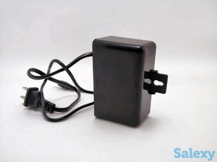 Продам блок питания 12В, 2А в подвесном пластиковом корпусе с индикатором питания и разъемом «Папа» 5.5x2.1мм для камер, фотография 1