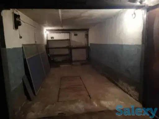 Подземный гараж со смотровой канавой в центре города, фотография 4