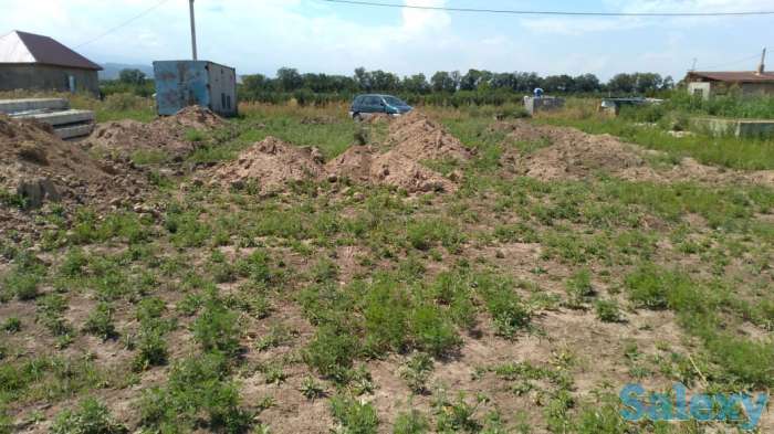 Продаю земельный участок. 6 соток,ровный рядом с трассой,в Талгарском районе по Алатауской трассе   Коммуникации: свет,, фотография 1