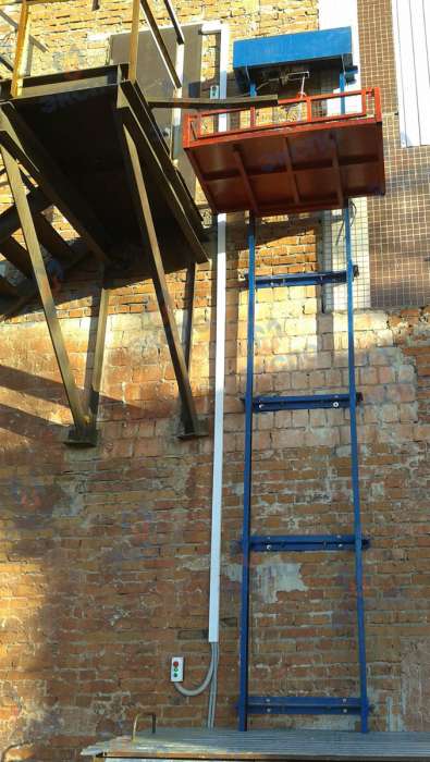 Консольный подъемник для склада, фотография 1