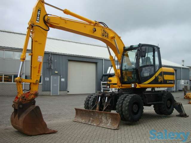 Услуги колесного экскаватора, фотография 1