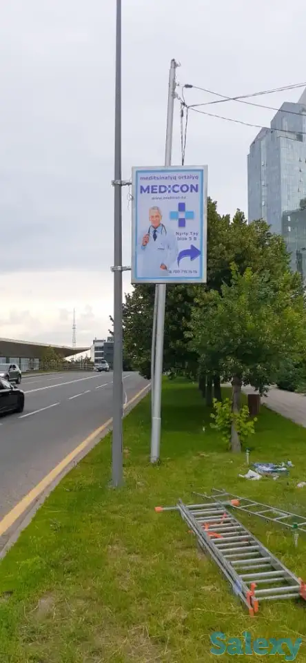 Резмещение рекламных щитов на придорожных столбах и опорах, фотография 9