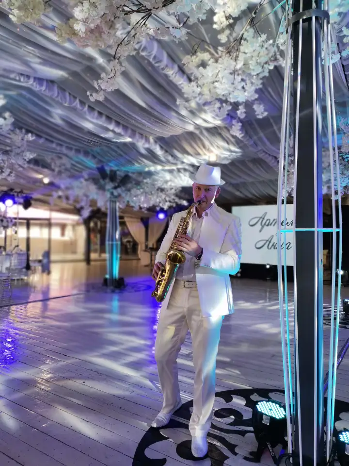 Саксофонист, саксофон, фотография 1