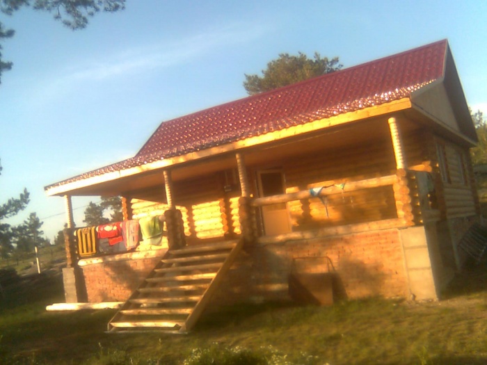 Продам продается новый дом с баней из оцилиндрованных бревен, фотография 1