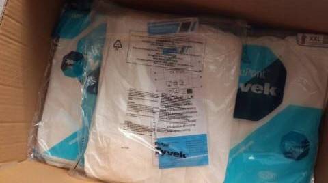 Однаразовые комбинезоны , фотография 2