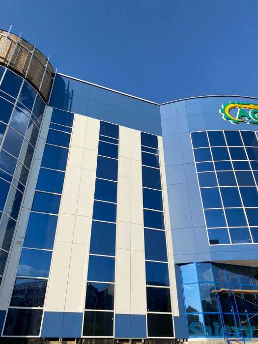 наружная отделка дома фиброцементными панелями, фотография 2