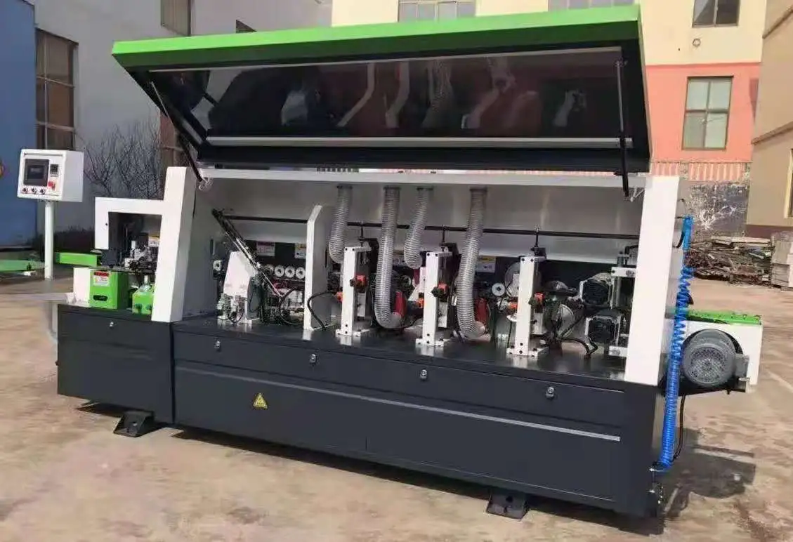 Aвтоматическая кромкооблицовочная машина с двойной обрезкой древесных плит, фотография 1