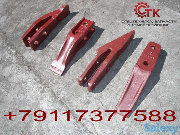 Зубья и бокорезы ковшей экскаваторов-погрузчиков, фотография 1