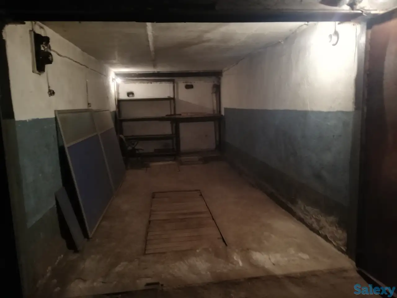 Подземный гараж со смотровой канавой в центре города, фотография 5
