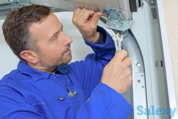 Ремонт секционных ворот, фотография 2