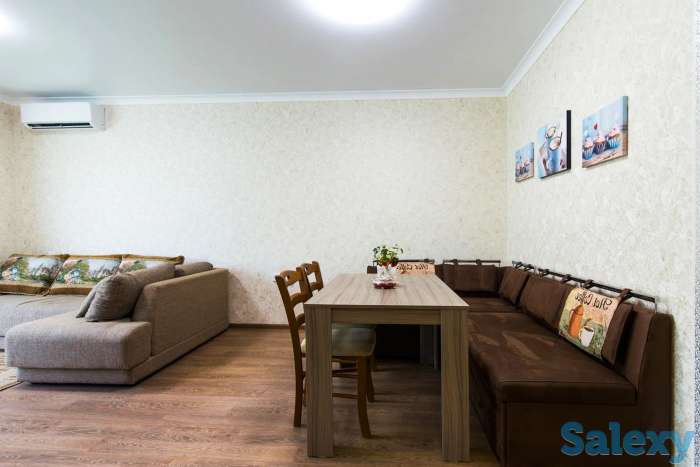 Комфортные апартаменты в центре города, Ул. Навои 9/1, фотография 2