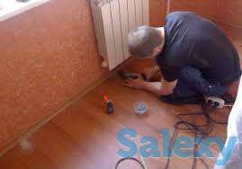 Укладка линолеума, установка плинтуса, фотография 1