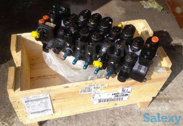 Гидравлический распределитель передний, задний на экскаватор-погрузчик Caterpillar 428 (C, D, E, F), 432 E, F, фотография 1