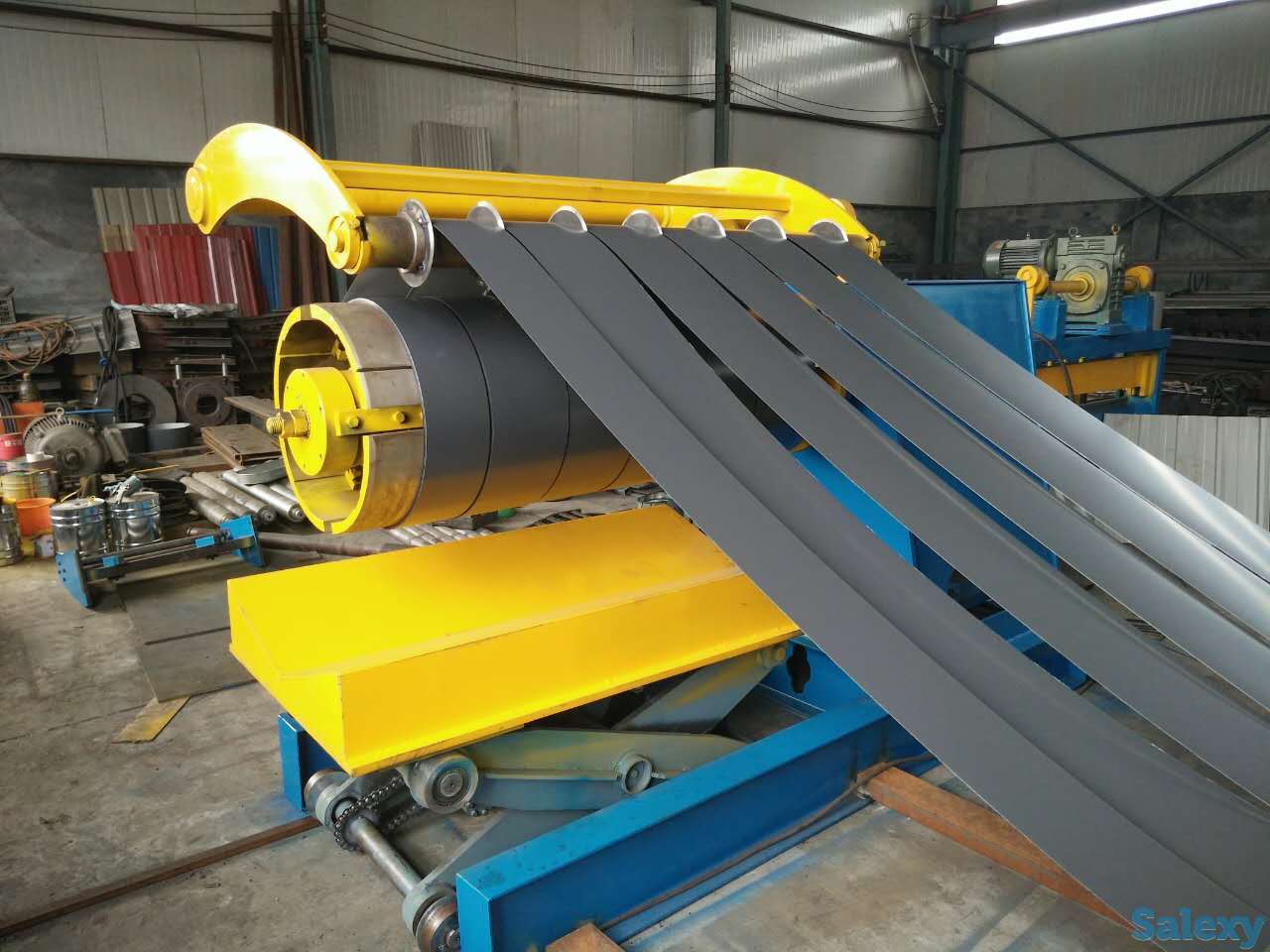 Линия поперечной резки рулонного металла СJB2-1250   Ⅰ. Вид      Справа налево: Гидравлическая тележка → Разматыватель →, фотография 1