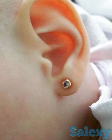 Прокол ушей, фотография 1